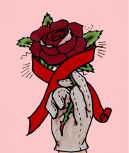 main gantée tenant une rose