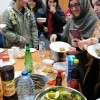 Repas convivial autour des spécialités culinaires des pays d'origine des étudiants